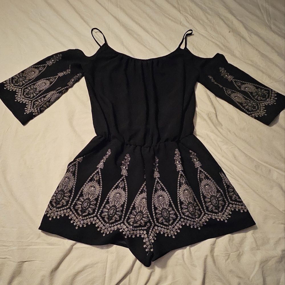 Bisou Bisou Black Romper with white design on sleeves and "shorts", size 4